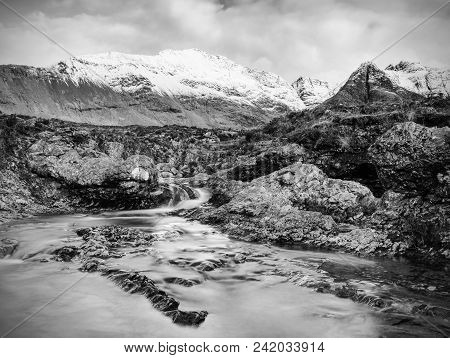 Multiple Waterfalls On River Brittle  With Many Cold Swimmable Pools. Black And White Photography