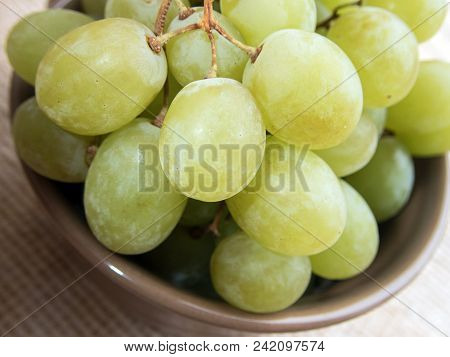 A Close Up View Of Tasty, Juicy, Green Grapes