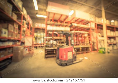 Vintage Blurred Large Hardware Store And Forklift Stacker Loader
