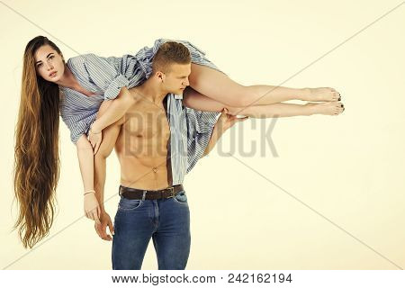 Passionate Couple Kissing, Boy And Girl. Man With Muscular Torso Hold Woman With Long Hair On Should