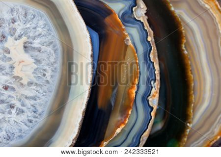 A Lot Of Polished Agates Of Different Colors.