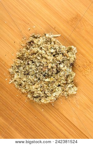 Pile Of Dried Mullein Leaves On A Wood Background