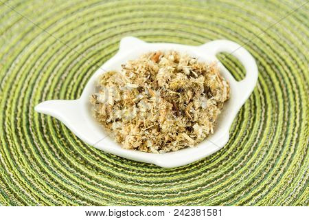 Dried Mullein Leaf Tea On A Cloth Background