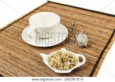 Dried Mullein Leaf Tea On A Wood Background