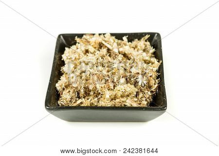 Dried Mullein Leaf Tea In A Bowl Isolated On A White Background