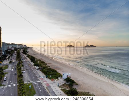 Drone Photo Of Sunrise In Barra Da Tijuca Beach And Boardwalk, Ilhas Tijucas And Cagarras In The Bac