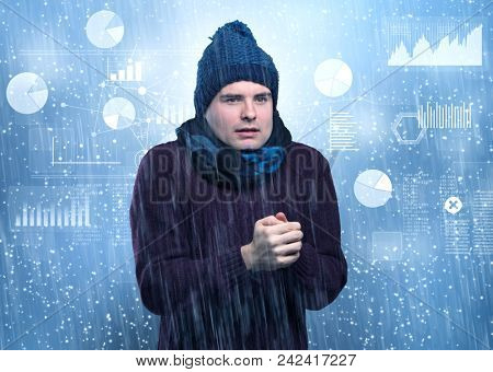 Young businessman shivering with graphs, reports and chart concept