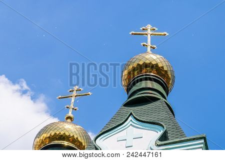Eastern Orthodox Crosses On Gold Domes Or Cupolas.