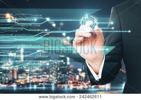 Businessman Drawing Creative Circuit On Abstract Blurry Night City Background. Technology And Comput