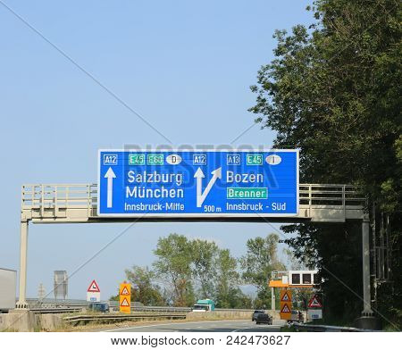 Big Traffic Signs With Directions To The City And The State Borders On The Austrian Motorway