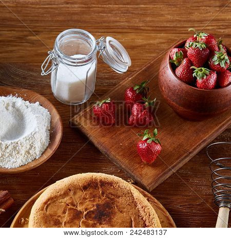 Recipe For Strawberry Pie, Fresh Strawberries, Flour And Sugar For Cooking Cake In Clay Bowl On Wood