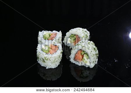 Sushi Set On Black Plate, Closeup Of Food