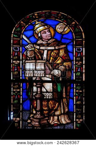 LUCCA, ITALY - JUNE 03: Stained glass window in the Santi Paolino e Donato church in Lucca, Tuscany, Italy on June 03, 2017.