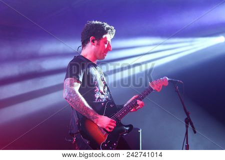 NEW YORK-DEC 10: Joe Trohman of Fall Out Boy performs onstage at Pandora's Holiday Show at Pier 36 on December 10, 2015 in New York City.
