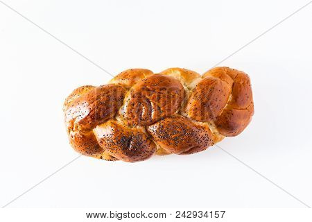 Braided Bread Sprinkled With Poppy Seeds, Isolated On White. Cop