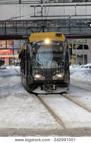 Minneapolis, Mn - January 15, 2011: A Light Rail Train On The Street In Downtown Minneapolis, Minnes