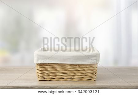 Straw Emprty Basket Decorated With White Linen On Wooden Table,food Advertisement Template.container