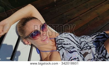 Woman Shooting Self Portrait. Take Photo And Video On Smartphone. Girl Rest, Relax, Walk In Sunglass
