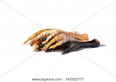 Group Of Chickens Feet On A White Background. Great Organic Snack For Dogs And Cats. This Image Is G