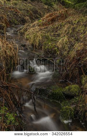 Upper Watercourse Of Bilina River In Krusne Hory Mountains In Winter Day