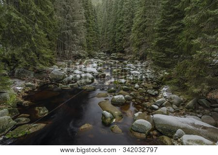 Vydra River In Winter Cold Day In National Park Sumava