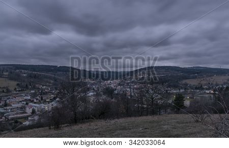 View Over Vimperk Town In Winter Dark Cold Evening
