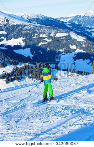 Child Skier Skiing In Ski Resort Penken Park In Austria