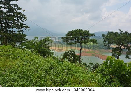 Barapani Or Umiam Lake Of  Shillong, Meghalaya As Seen Fron The View Point On The Road With Water, T