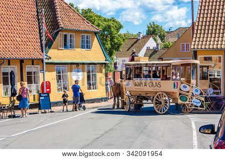 Svaneke, Bornholm, Denmark - June 2018. It Is Possible To Ride A Horse-drawn Carriage During The Sum