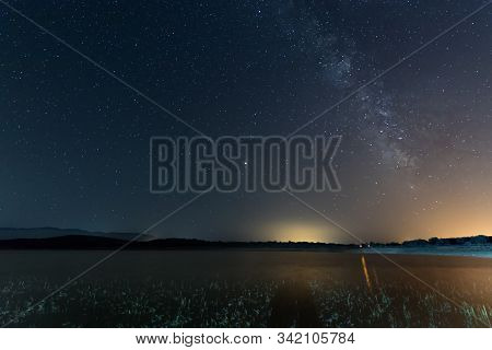 Milky Way From The Gabriel And Galan Reservoir. Extremadura. Spain.