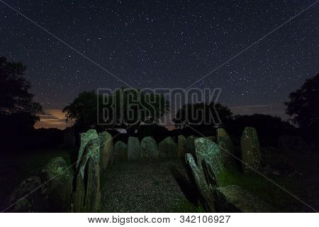 Dolmen Of The Great Oak. Night Landscape With Ancient Prehistoric Dolmen. Montehermoso. Extremadura.