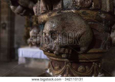 Skull In The Church. Detail In A Column Of The Church In La Alberca. Spain.