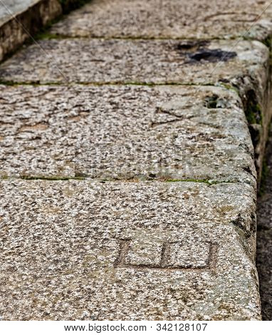 Letters Indicating The Seats In The Bleachers Of The Roman Theatre Of Merida. Spain.