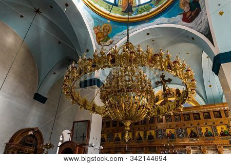 Jerusalem, Israel, December 28, 2018 : Large Decorative Gilded Lamp Hanging In The St. Nicholas Chur