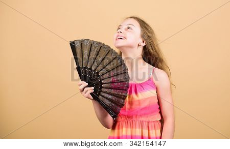 Cooling And Ventilation. Summer Heat. Fresh Air. Kid Girl Fanning Herself With Fan. Conditioning Sys