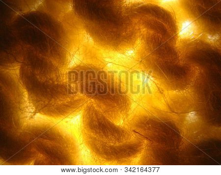 Makro Detail Of Knitted Yellow Fabric In Daylight
