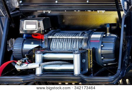 A Powerful Electric Winch Is Located In The Cargo Compartment Of An Equipped Fire Truck.