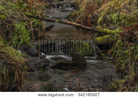 Upper Watercourse Of Bilina River In Krusne Hory Mountains In Winter Day