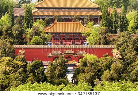 Chinese Buildings Within Jingshan Park Located Within The City Of Beijing China.