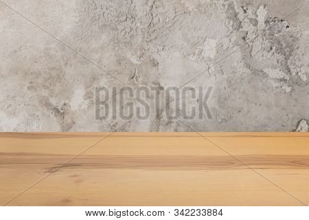 Wooden Board Empty Table In Front Of A Blurred Background. Perspective Brown Wood With Blurry Grunge