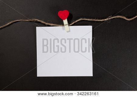 Paper Sticker Attached With Clothespins On A Rope And Hand Made Heart Makes. Valentines Day Black Ba