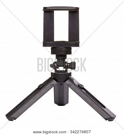 Small Black Tripod For Smartphone Isolated On White Background. Close Up.