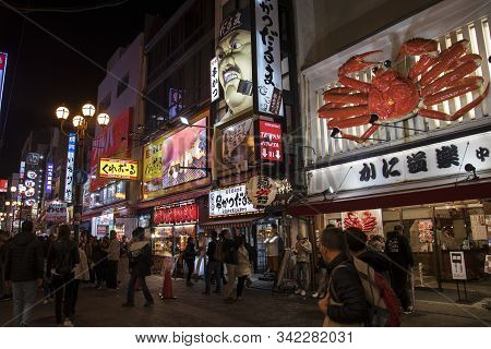 Osaka, Japan- 27 Nov, 2019: Beautiful Landscape View Of Japanese Store With Crowd Of Peoples And Tou