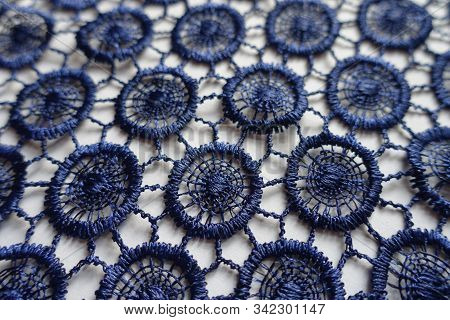 Close Shot Of Dark Blue Lacy Fabric