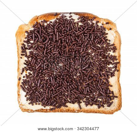 Top View Of Dutch Sweet Toast With Butter And Hagelslag (topping From Chocolate Sprinkles) Isolated 