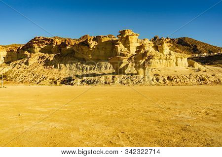 The Enchanted City Of Bolnuevo, Yellow Sandstone Shapes, Rock Formations, Murcia Spain. Tourist Attr