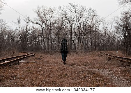 A Man On The Railway Steps On A Journey From Hustle And Bustle. Stock Photo.