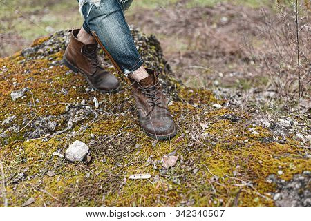Guy Hiking In Comfortable Hiking Boots. Boots Close-up Stock Photo.