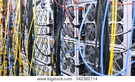 Wall Of Data Centers And Wires. Stock Footage. Lots Of Units With Data Center Fans And Hanging Cable