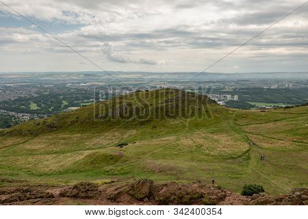 Landscape Of Edinburgh City In Scotland Viewed From Arthurs Seat In Overcast Weather